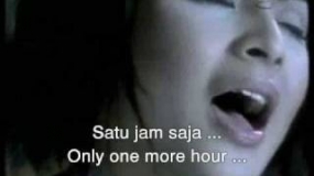 Popliedjes :  Satu Jam Saja gezongen door Audy