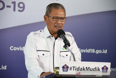 De regeringswoordvoerder van de COVID-19-respons, Achmad Yurianto