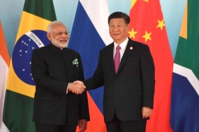 Photo d&#039;archives - Le Premier ministre indien Narendra Modi et le président de la République populaire de Chine Xi Jinping avant le sommet des BRICS, le 4 septembre 2017. (Kremlin/Bureau présidentiel de presse et d&#039;information via Wikimedia Commons)