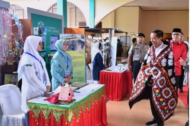 Presiden Jokowi saat menghadiri Kenduri Kebangsaan di Bireun, Aceh, Sabtu. (Biro Pers Setpres)
