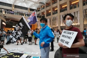Buitenland : Australië is van plan Britse maatregelen te nemen om visa te geven aan burgers van Hong Kong