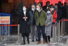 En enquêtant sur l&#039;origine de Covid-19, l&#039;équipe de l&#039;OMS visite le marché de Wuhan