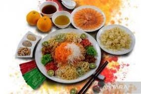Milchfisch Essen beim chinesischen Neujahrsfest