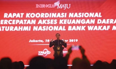 Presiden Joko Widodo berpidato dihadapan peserta Rapat Koordinasi Nasional Tim Percepatan Akses Keuangan Daerah (TPAKD) dan Silahturahmi Nasional Bank Wakaf Mikro 2019 di Jakarta, Selasa (10/12/2019). ANTARA 