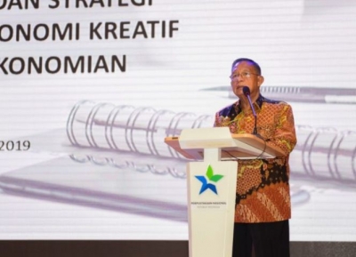 Menteri Koordinator Bidang Perekonomian Darmin Nasution saat menyampaikan Keynote speech dalam acara sosialisasi Rencana Induk Ekonomi Kreatif Tahun 2018-2025, Senin (15/7), di Jakarta.