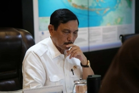 卢胡特部长赞赏廖内群岛省省长处理印尼移民工人的表现