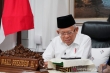 副总统希望印尼和新加坡鼓励全球经济稳定