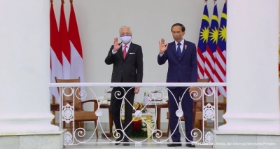 印尼总统会见马来西亚总理，推动完成印尼移民劳工保护谅解备忘录和边境谈判