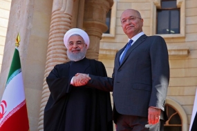 Presiden Iran Hassan Rouhani (kiri) saat diterima Presiden Irak Barham Salih, dalam kunjungan resminya, Senin (11/3/2019).(AFP / SABAH ARAR)  Artikel ini telah tayang di Kompas.com dengan judul &quot;Abaikan Peringatan AS, Irak Terima Kunjungan Presiden Iran&quot;, https://internasional.kompas.com/read/2019/03/11/20354191/abaikan-peringatan-as-irak-terima-kunjungan-presiden-iran.  Penulis : Agni Vidya Perdana Editor : Agni Vidya Perdana